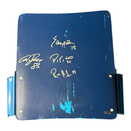 A blue seatback from Northlands Coliseum with signatures of Edmonton Oilers players Ales Hemsky, Raffi Torres, Ryan Smyth, and Ethan Moreau.