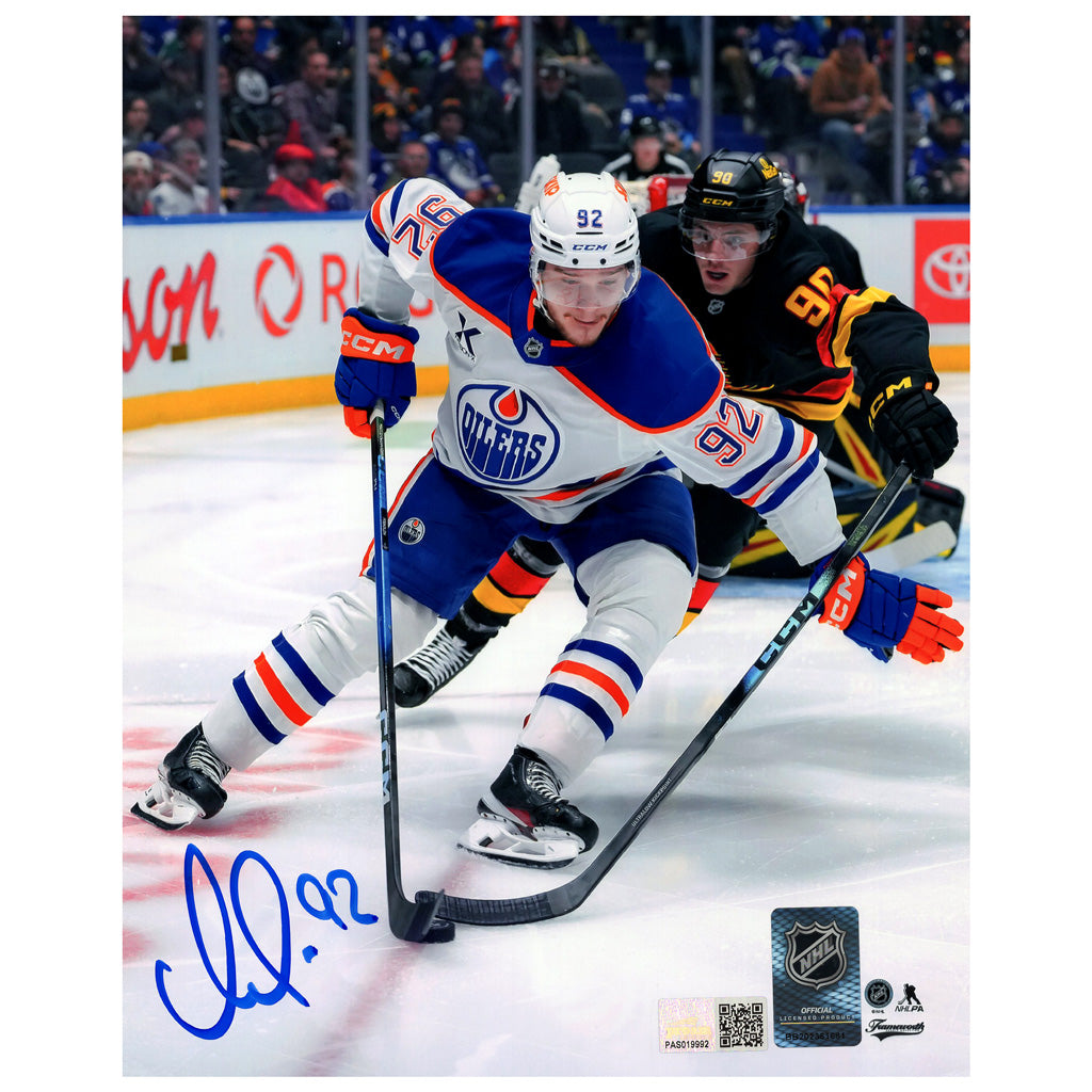 Vasily Podkolzin Signed Edmonton Oilers White Road Action Protecting The Puck 8x10 Framed Photo