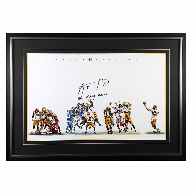 Framed photo of football games autographed by Aaron Rodgers with 