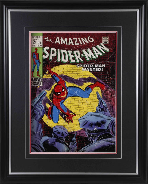 Framed cover of the Amazing Spider-Man comic #70. Spiderman show on wall crouching from police, text reading "Spider-Man Wanted!"
