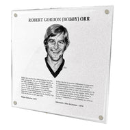 Photo of acrylic replica of Bobby Orr's plaque in the NHL Hockey Hall of Fame. Plaque design features illustrated portrait of Orr, as well as a biography in french and english.