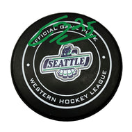 Black WHL Seattle Thunderbirds official game puck, signed by Ethan Bear in green ink.