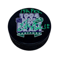 Official 1994 NHL draft puck signed by Ethan Moreau Edmonton Oilers in green ink with "14th pick" inscription.
