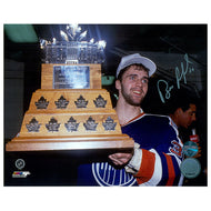 Signed photo of Bill Ranford of the Edmonton Oilers holding the 1990 Conn Smythe trophy
