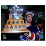 Signed photo of Bill Ranford of the Edmonton Oilers holding the 1990 Conn Smythe trophy 