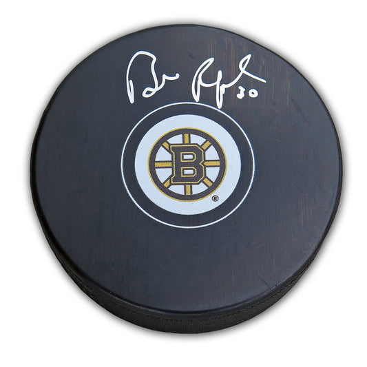 Black hockey puck with Bruins logo and Bill Ranford signature on a white background