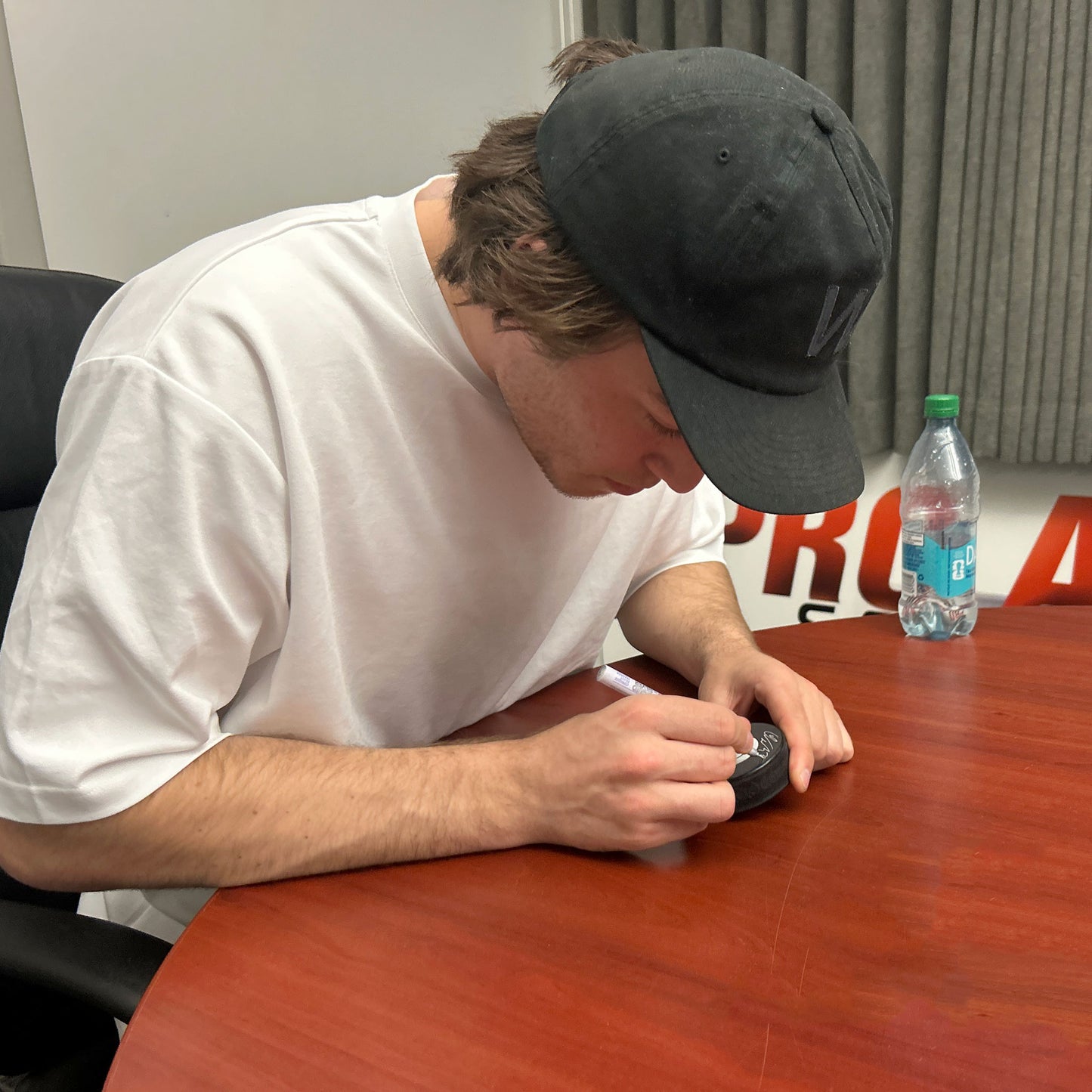 Colton Dach Signed Edmonton Oilers Mid Size Logo Puck