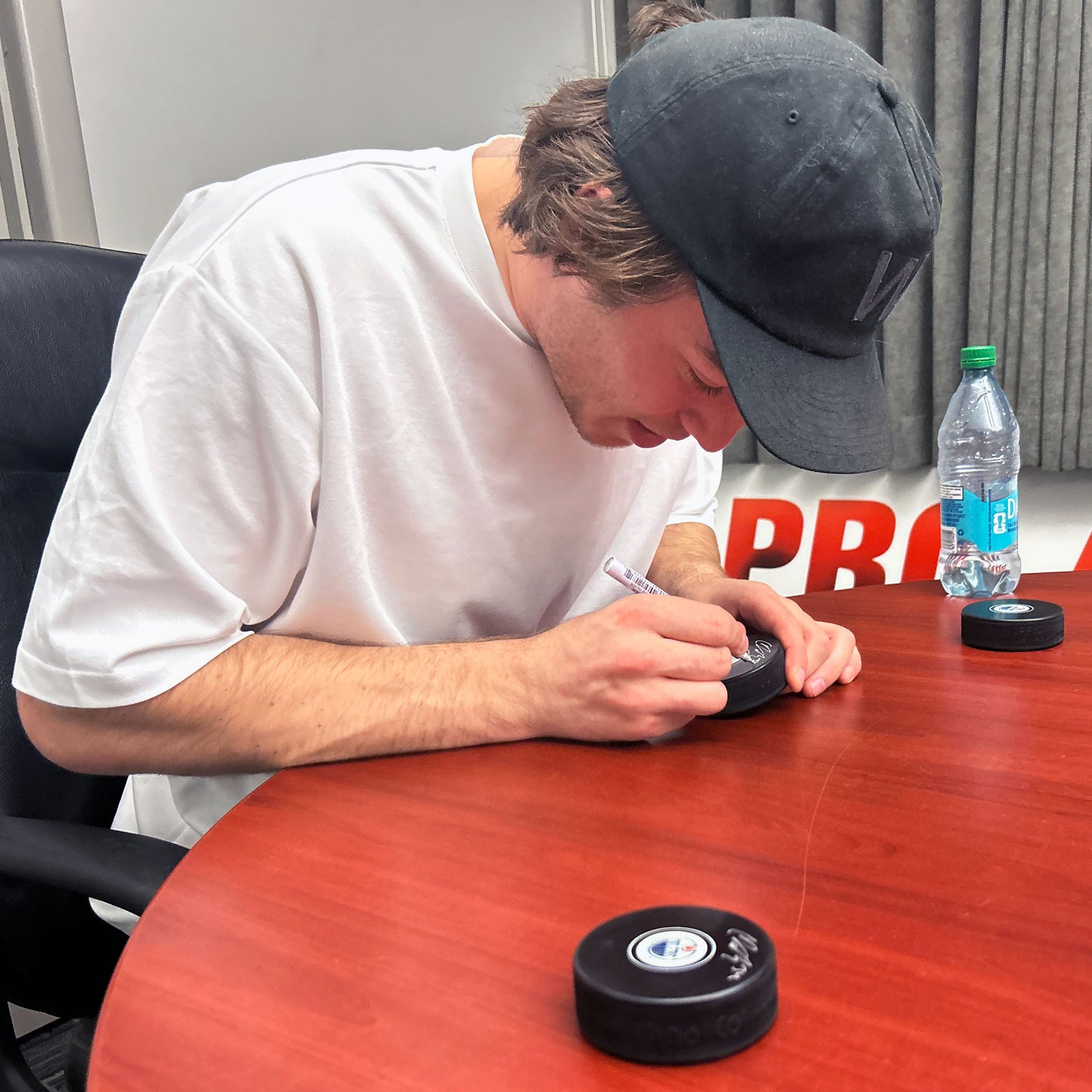 Colton Dach Signed Edmonton Oilers Small Logo Puck