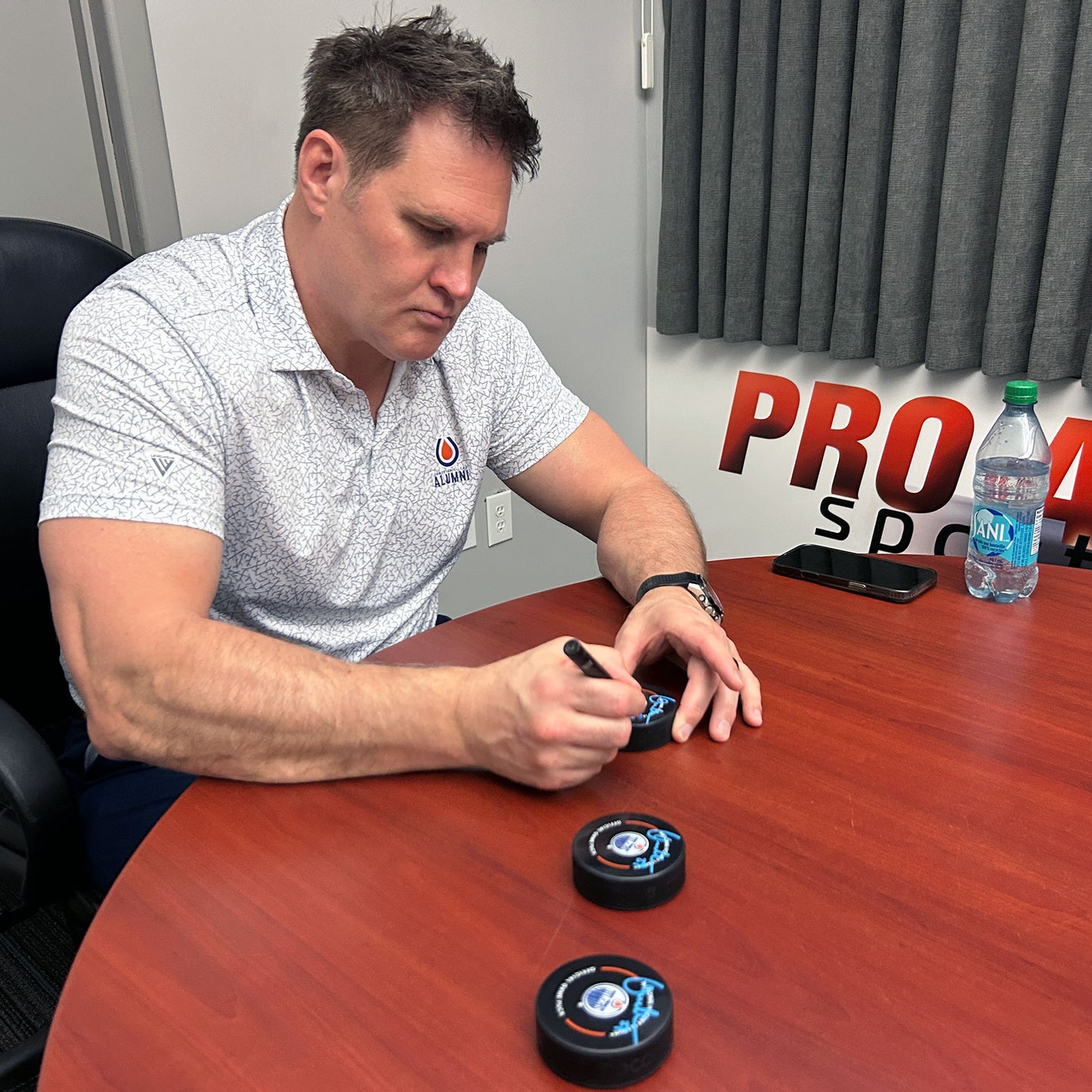 Louie DeBrusk Signed Edmonton Oilers Official Game Model Puck