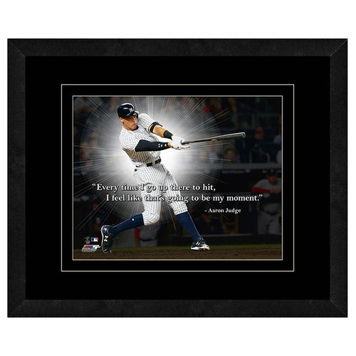 Framed photo of Aaron Judge of the New York Yankees at bat with quote "Every time I go up there to hit, I feel like that's going to be my moment" on top