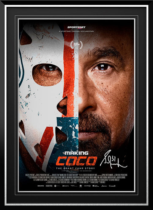 Film poster for "Making Coco" featuring photo of NHL hockey player Grant Fuhr, one side of his face partially covered by a white, navy and orange goalie's mask. Bottom of poster has film credits. Poster is signed in silver ink by Grant Fuhr. Poster is shown in a black frame with black mat. 