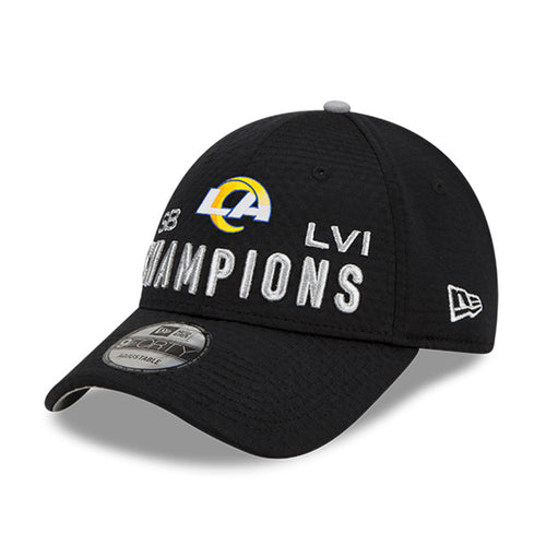 Angled left view of Los Angeles Rams Super Bowl LVI Champions 9Forty Snapback cap. Design features bold LA Rams logo and raised silver text  reading "SB LVI CHAMPIONS"
