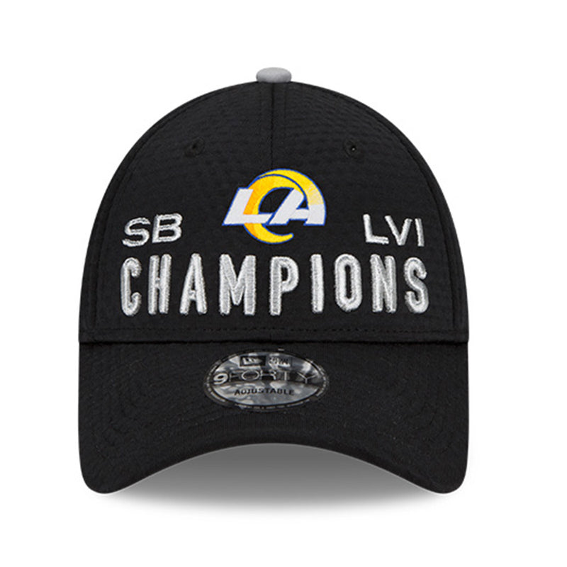 Front view of Los Angeles Rams Super Bowl LVI Champions 9Forty Snapback cap. Design features bold LA Rams logo and raised silver text  reading "SB LVI CHAMPIONS"
