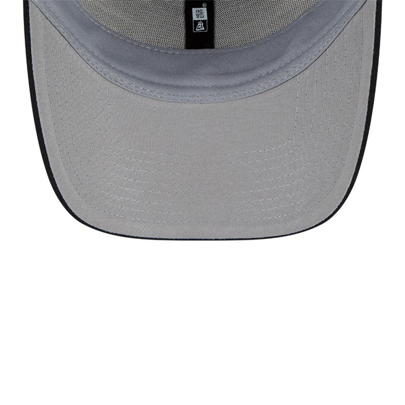 Inside brim view of Los Angeles Rams Super Bowl LVI Champions 9Forty Snapback cap.  Hat features a light grey lining and inner brim