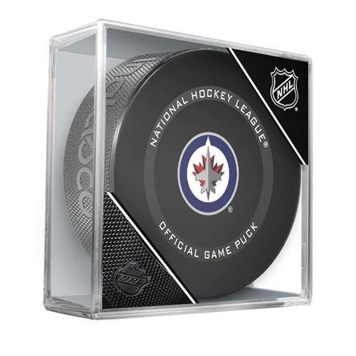 Official 2021-22 Winnipeg Jets NHL game puck; design features the Jets logo in the centre of the puck face; puck is shown stored in a clear plastic puck cube. 