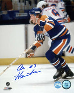 Signed photograph of Al Hamilton skating during an Edmonton Oilers NHL hockey game