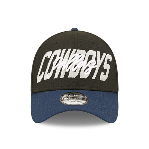 Front view of 2022 Dallas Cowboys NFL Draft cap from New Era. Design features embroidered team name on front panels; body of cap is constructed in black with contrasting team colour brim and embroidery.
