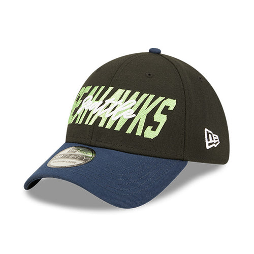 Angled front view of  2022 Seattle Seahawks NFL Draft cap from New Era. Design features embroidered team name on front panels; body of cap is constructed in black with contrasting team colour brim and embroidery.