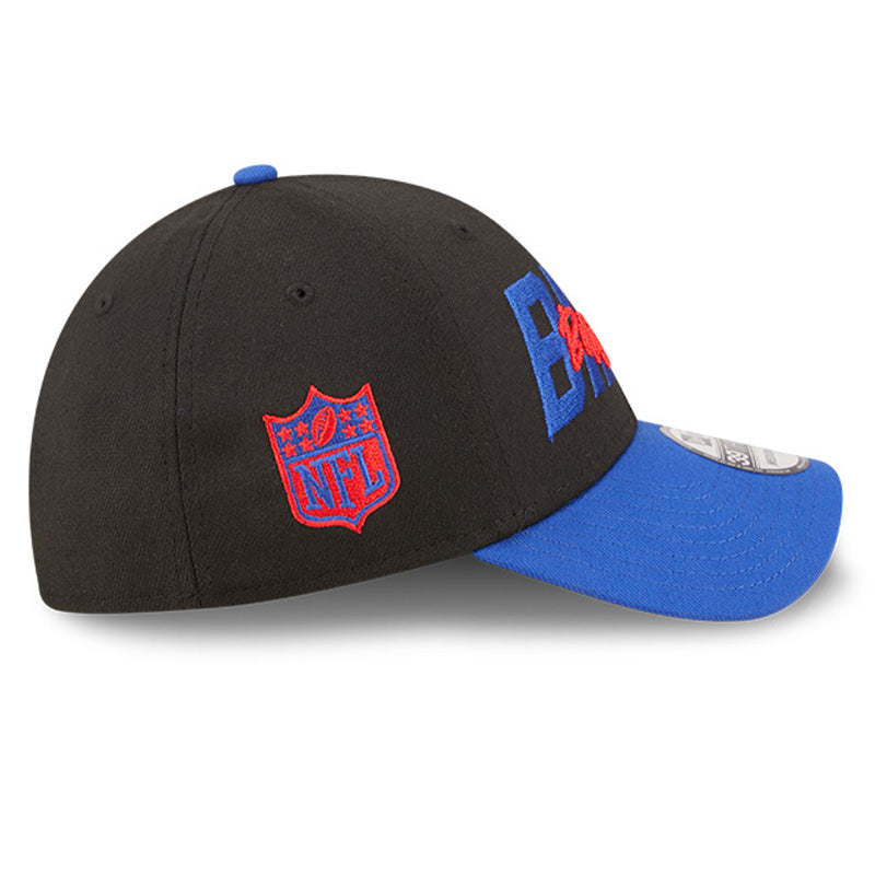 Right side view of the Buffalo Bills NFL Draft cap from New Era. Design features embroidered team name on front panels; body of cap is constructed in black with contrasting team colour brim and embroidery. NFL logo is embroidered on the right in red and blue. 