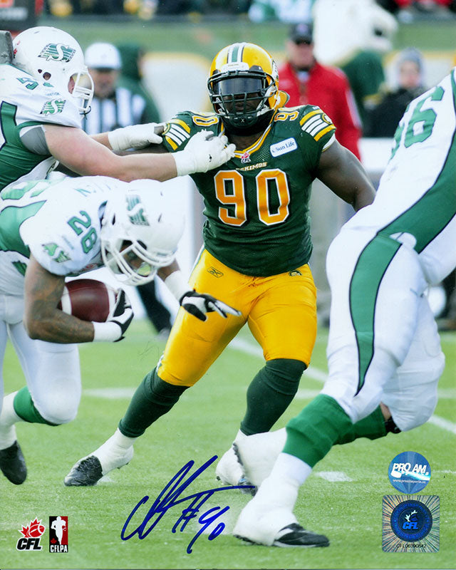 Signed photograph of Almondo Sewell dodging opponents during an Edmonton Elks, Edmonton Football Team, CFL football game