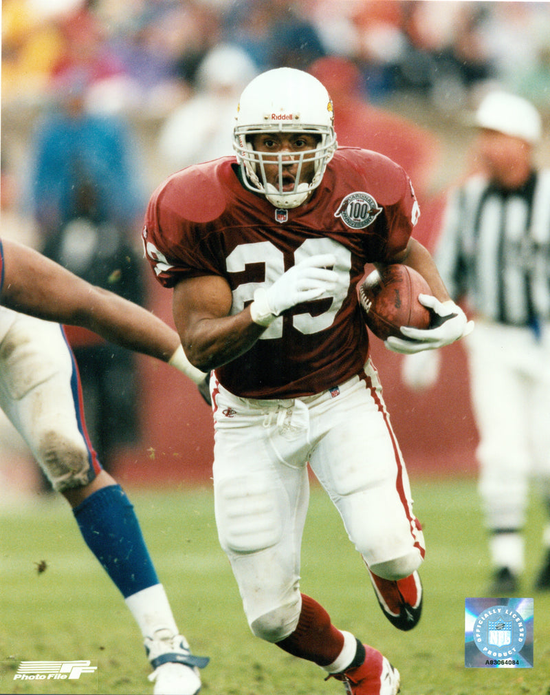 Adrian Murrell of the Arizona Cardinals running with the  football during an NFL game 