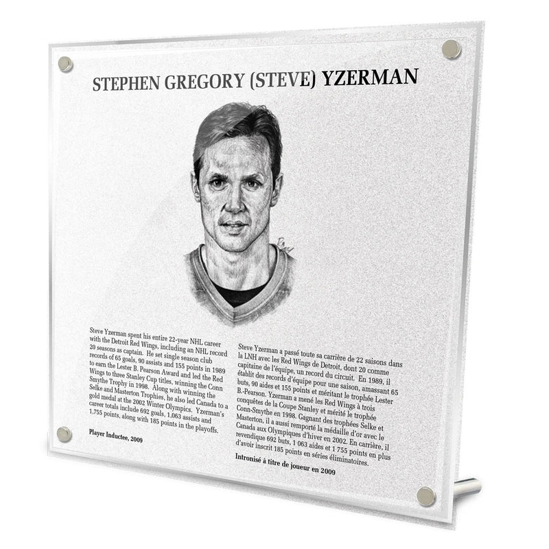 Front view of replica Hockey Hall of Fame plaque of Stephen Yzerman, featuring black and white illustrated portrait and biography in English and French. Made from acrylic with metal hanging hardware
