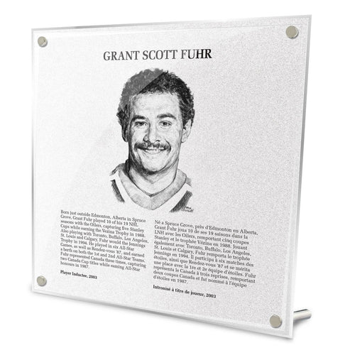 Front view of replica Hockey Hall of Fame plaque of Grant Fuhr, featuring black and white illustrated portrait and biography in English and French. Made from acrylic with metal hanging hardware