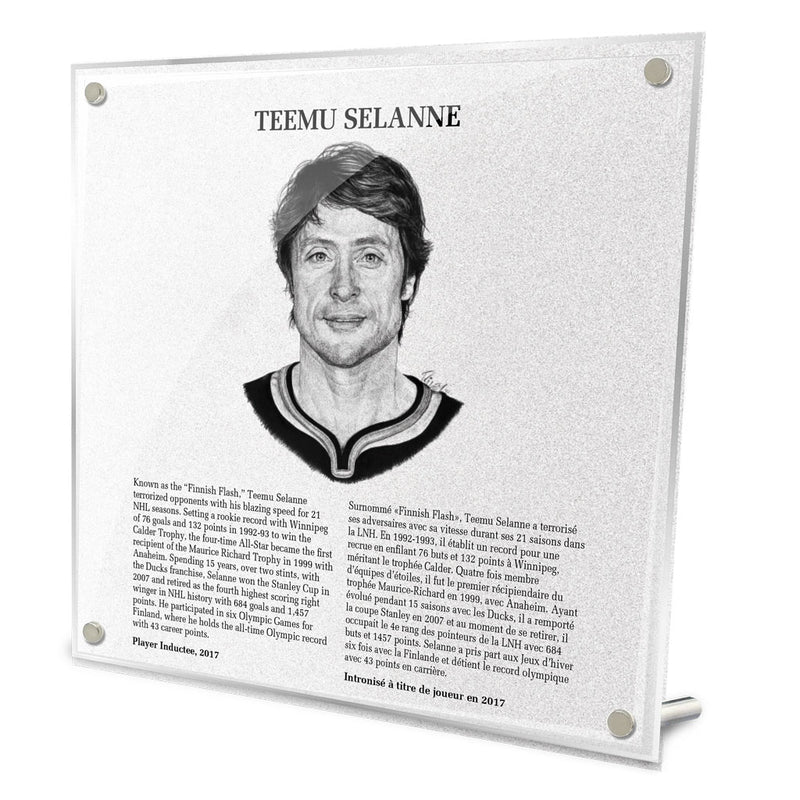 Front view of replica Hockey Hall of Fame plaque of Teemu Selanne, featuring black and white illustrated portrait and biography in English and French. Made from acrylic with metal hanging hardware