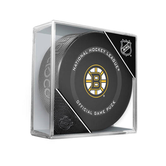 Black hockey puck with NHL official game puck design and Boston Bruins logo in the centre. Displayed in a clear acrylic puck case with NHL shield in the corner. 