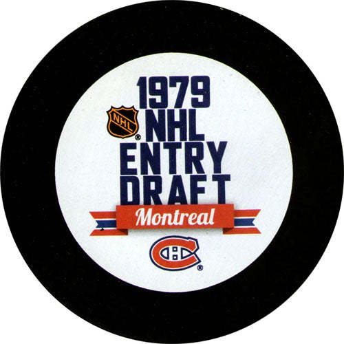 Black hockey puck with 1979 Montreal NHL  hockey draft design featuring NHL and Canadiens logos