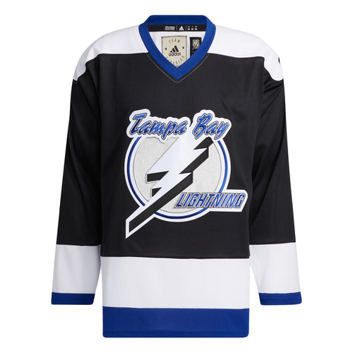 Front view of the  1992 Tampa Bay Lightning jersey featuring black, white and blue colour blocking with large embroidered Tampa Bay Lightning logo with circle and large lightning bolt. 