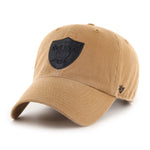 Las Vegas Raiders '47 Clean Up Cap in Dune; cap is constructed in tan brown cotton twill with team logo in raised black embroidery. The Clean Up cap is a relaxed, curved one-size-fits-all fit with self-fabric strap for adjustment. 