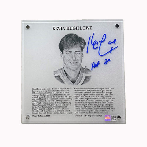 Front of signed acrylic replica of Kevin Lowe's Hockey Hall of Fame plaque. Plaque includes illustrated portrait of Lowe as well as bio in English and French. Plaque is signed by Lowe in the top right corner with "HOF 20" inscription. Shown with silver stand. 