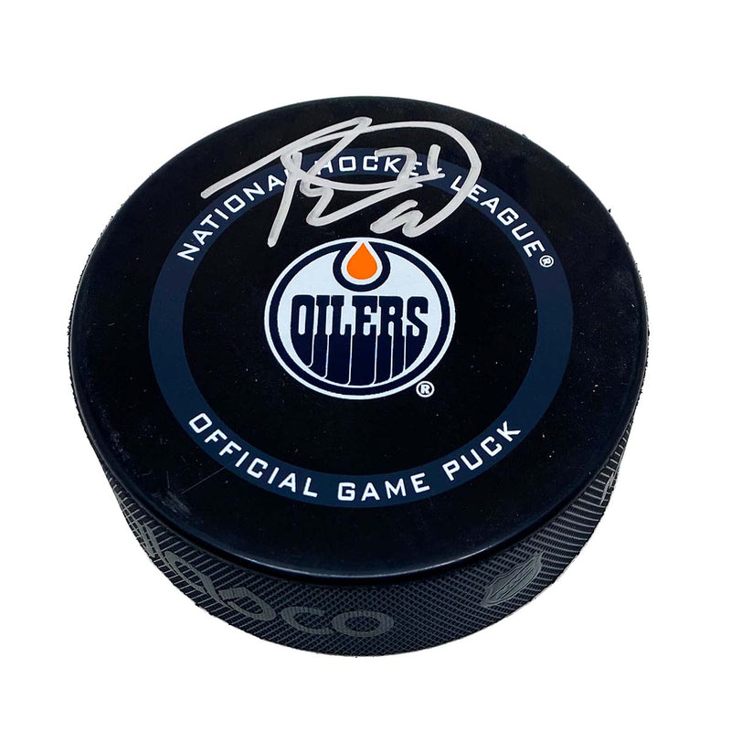 Edmonton Oilers Official NHL game puck signed in silver by Ryan McLeod. Signature is on the top half of the puck 