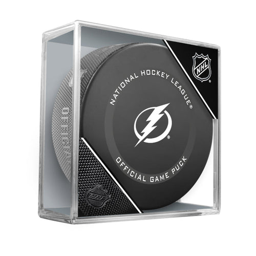 Official 2021-22 Tampa Bay Lightning NHL game puck; puck design features Tampa Bay Lightning logo on the centre of the front face of the puck. Puck is shown displayed in a clear puck case. 