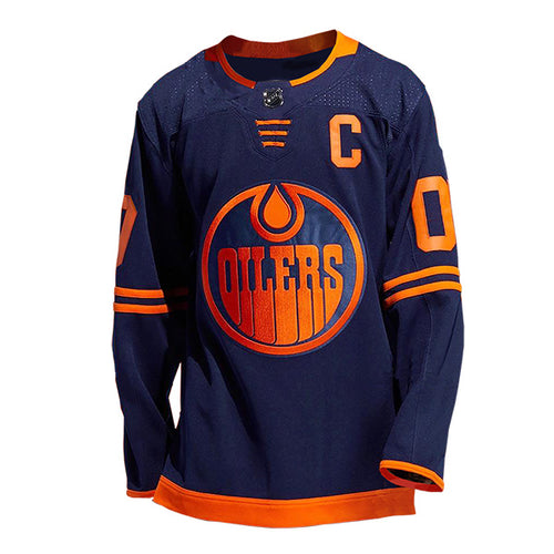 Front view of a navy and orange Edmonton Oilers third alternate NHL jersey with orange captain's "C" on front chest, orange stripes on lower sleeves, and orange bottom hem 