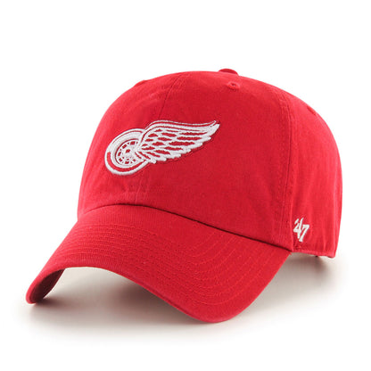 A red Detroit Red Wings '47 Clean Up cap with the team's logo on the front.