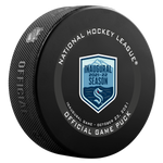 Black hockey puck with Official NHL Inaugural Seattle Kraken game puck design. 