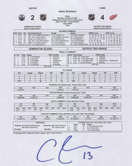 Autographed game summary of Andrew Cogliano first goal 
