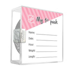 Back view of pink "My First Puck" packaging, which includes spaces to write baby's birth information, including time and date of birth, weight, and length. 