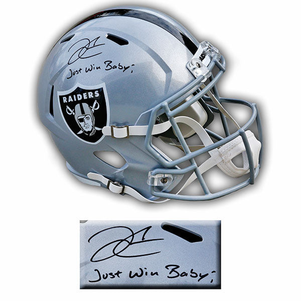 Silver Las Vegas Raiders Riddell replica helmet signed by Derek Carr with inscription "Just Win Baby!" in black ink. Inset photo shows detail of signature and inscription