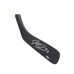 Close up of black hockey stick blade with silver Connor McDavid autograph
