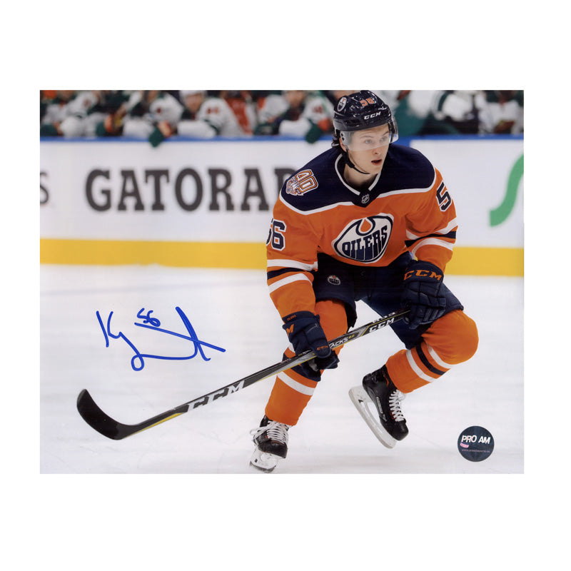 Kailer Yamamoto Edmonton Oilers skating during an NHL hockey game wearing orange jersey. Photo is signed in the lower left corner. 