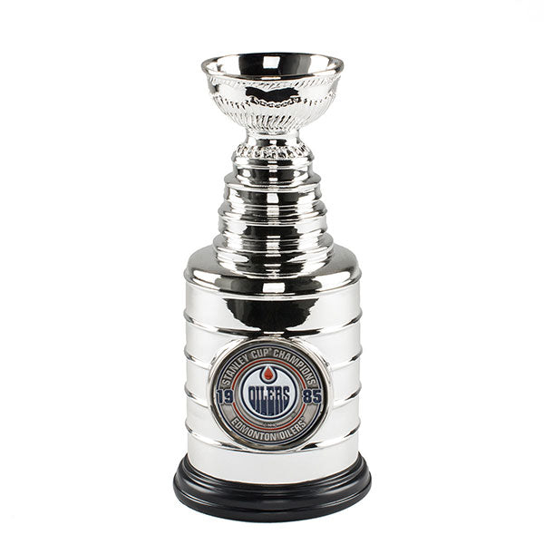 Edmonton Oilers 1985 8" Replica Stanley Cup with inset colour medallion featuring the Edmonton Oilers logo with championship year. Replica features a sturdy weighted base
